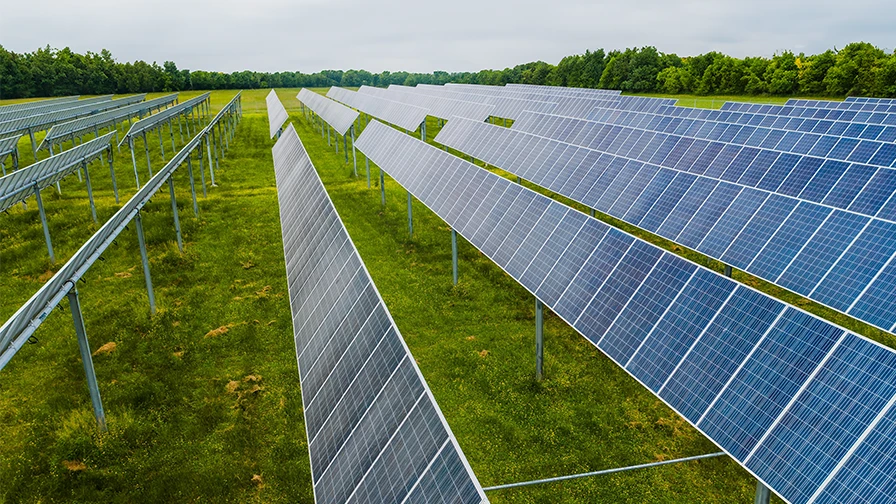 Solar panel farm on countryside agricultural land