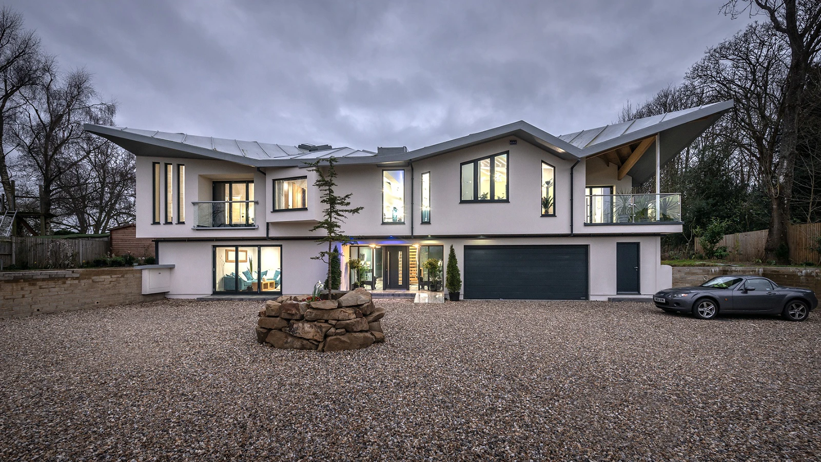 Spruce Architecture - stunning rolling roof contemporary dwelling in Maresfield